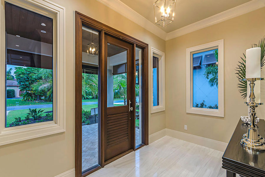Front entry of Naples, Florida home featuring Andersen windows & doors