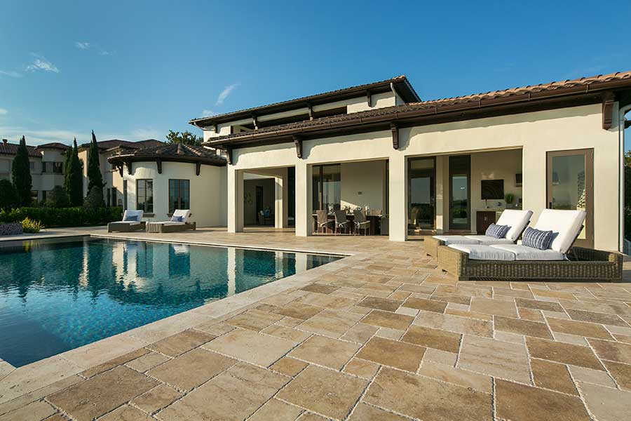 Swimming pool and outdoor living space of newly constructed home from Scholten Construction