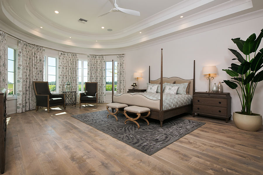 Interior design of master bedroom in Naples, Florida home by Scholten Construction Interior Design Services